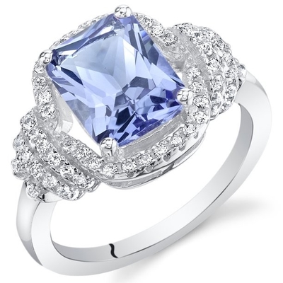 Los joyeros aporrean el acento Sterling Silver Ring de 1/4 quilate T.G.W. Tanzanite And White CZ