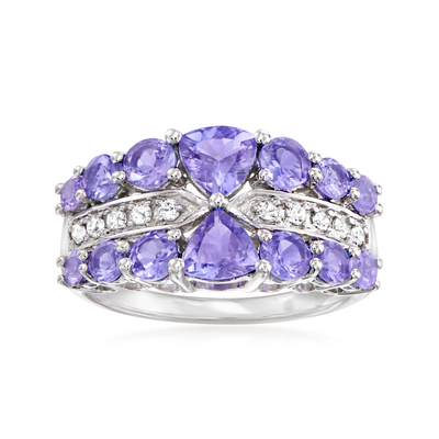 1,25 diente Tanzanite natural oval del quilate 4 y acento CZ blanca Sterling Silver Ring