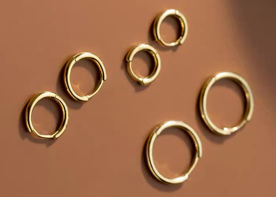 ODM atractivo de los pendientes del aro del oro de la hélice 14k para la dimensión de las mujeres 1.2mm×10m m